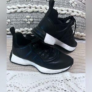 Black DKNY Sneakers size 5.5 with. Leather. Very lightly used.